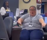 Shocked Woman At Desk