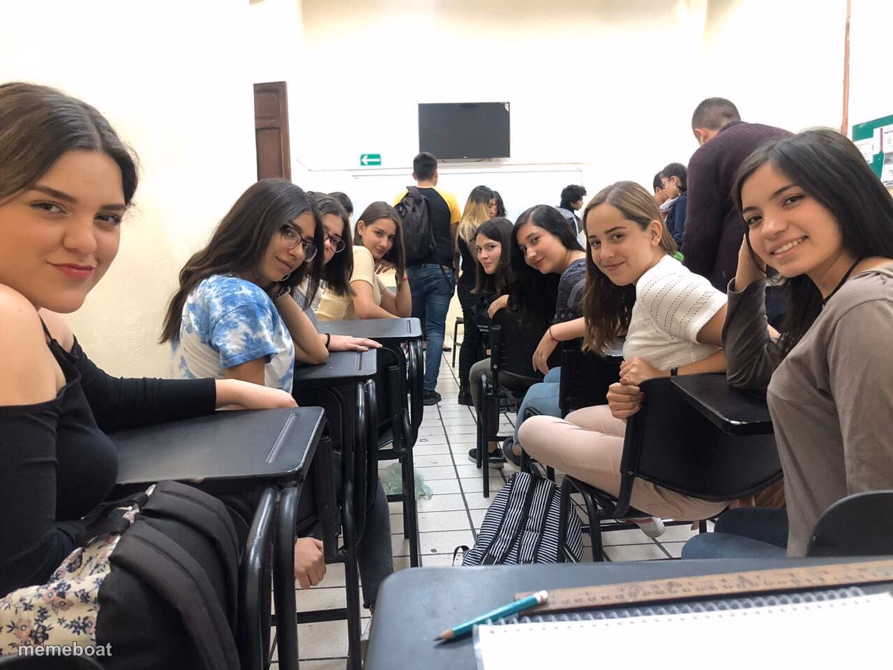 Girls in class looking back - meme generator image preview