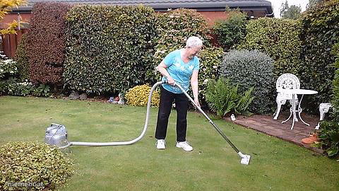 Grandma vacuuming yard - meme generator image preview