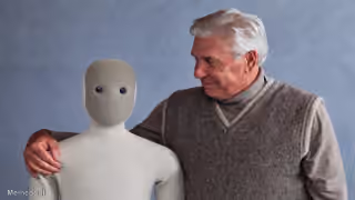Grandpa Looking at NEO Robot