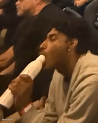 Guy Chugging Water Awkwardly During the xAI Hackathon