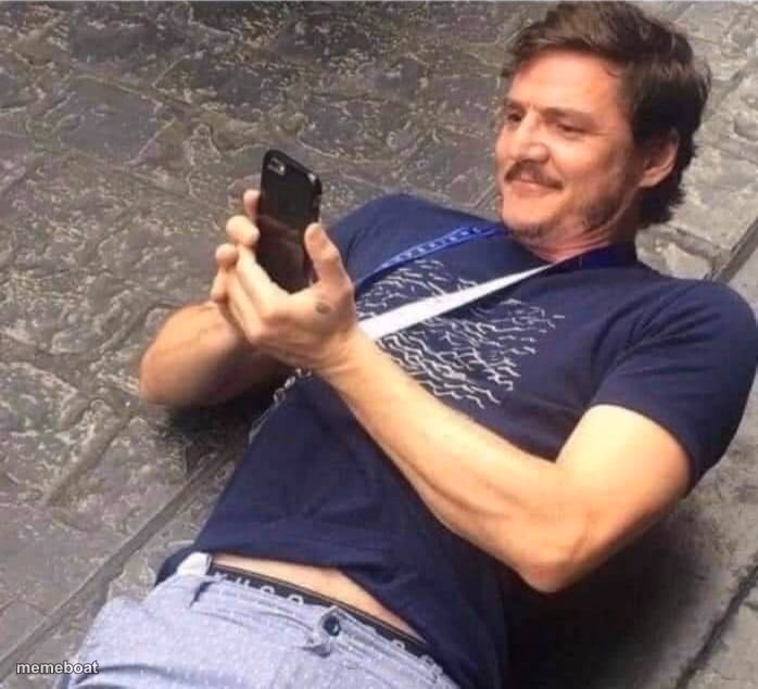 Guy looking on phone - meme generator image preview
