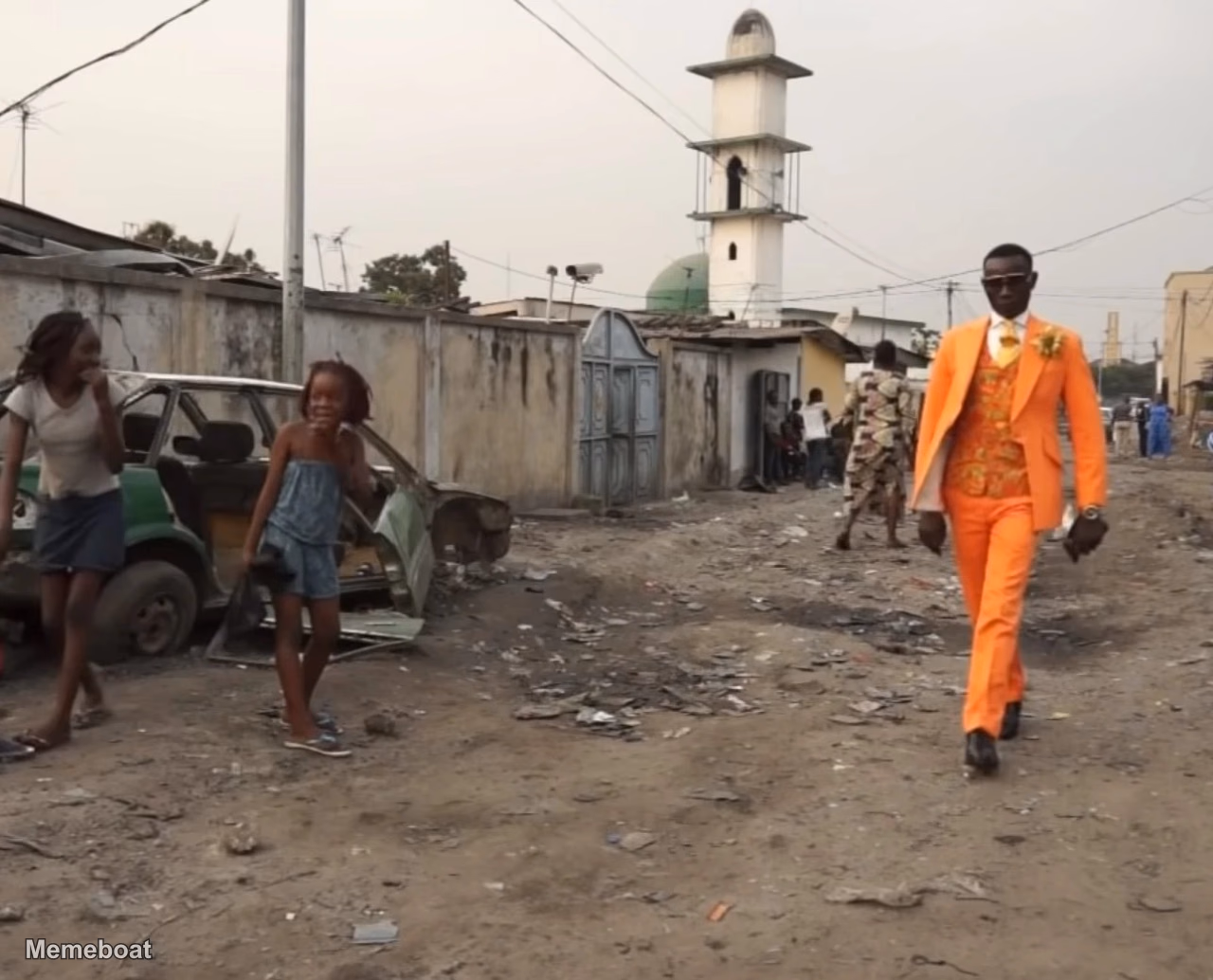 Guy With Fresh Bright Orange Suit in Slums - meme generator image preview