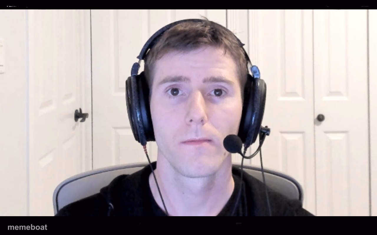 Guy with headphones staring at camera - meme generator image preview