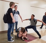 guys t posing over crying girl