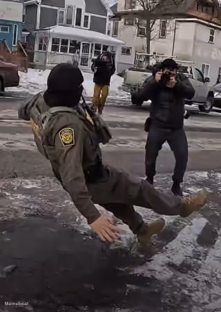 ICE Agent Slips on Ice