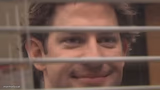 Jim smiles trough windows