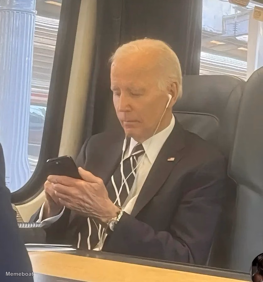 Joe Biden Focused on His Phone - meme generator image preview