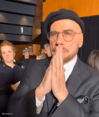 John Travolta Clasped Hands