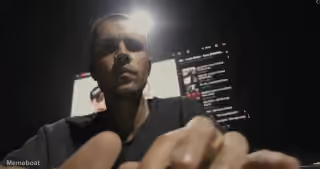Justin Bieber Locked in on His Laptop at Coachella