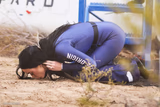 Katy Perry kissing soil