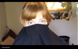 Lady with shirt over nose