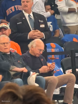 Larry David Checking Phone at NBA Finals