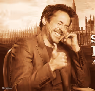 RDJ Laughing Thumbs Up