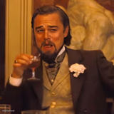 Leo DiCaprio chuckles