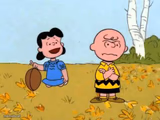 Lucy football and Charlie Brown