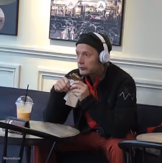 Mads Mikkelsen Eating With Headphones