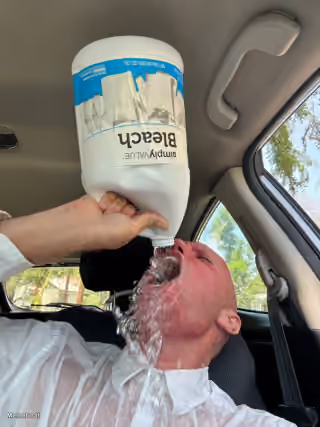 Man Drinking Water From Bleach Bottle