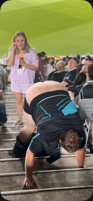 Man Mooning Shocked Woman