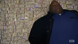 Man rolling in money
