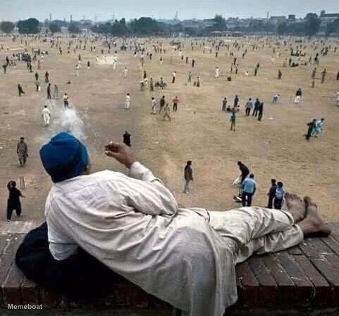 Man Watching Chaos While Smoking - meme generator image preview