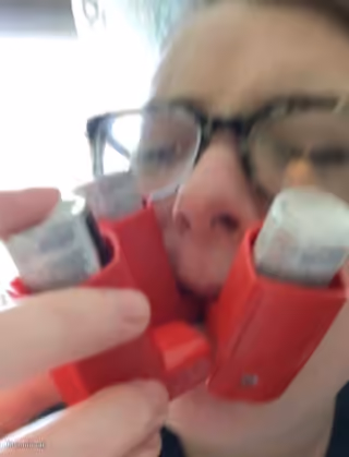 Me Taking Two Inhalers