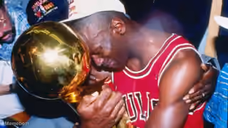 Michael Jordan Embracing Trophy