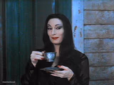Morticia drinking tea