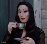 Morticia Drinking Tea