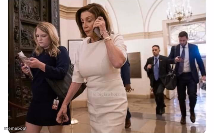 Nancy Pelosi on phone - meme generator image preview