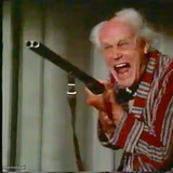 Old man with gun