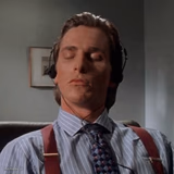 Patrick Bateman listening to music