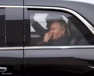 Putin Blocking His Nose Inside the Limo