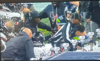 Referee Nate Jones Protecting Jaxon Smith-njigba