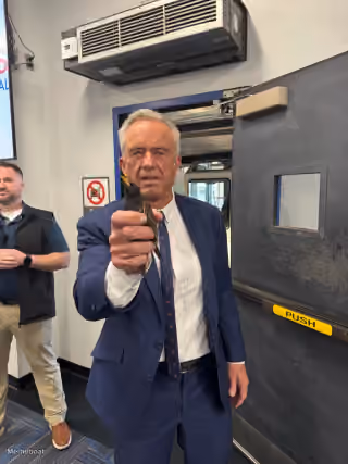 RFK Jr. Holding Starling Bird