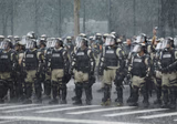 Riot Police Rain Storm