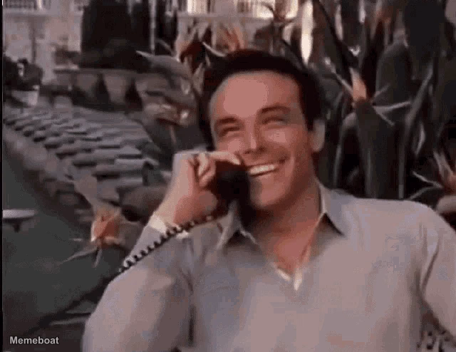 Robert Redford Laughing On The Phone - meme generator image preview