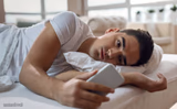 Sad guy in bed