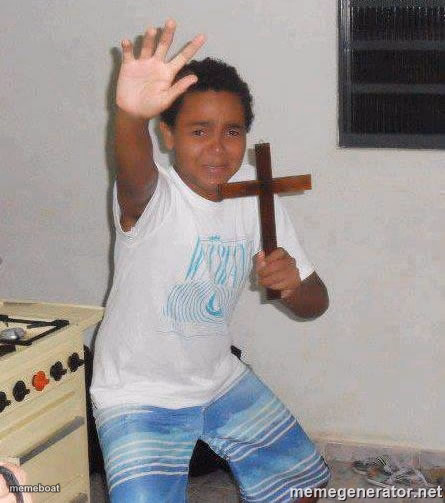 scared kid holding a cross - meme generator image preview