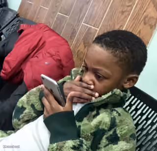 Shocked Kid on Phone