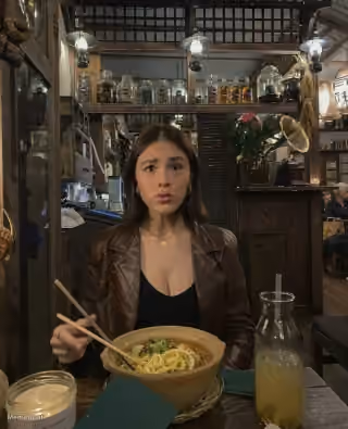 Shocked Woman Eating Noodles