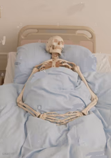 Skeleton in bed