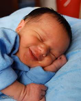 sleeping baby laughing
