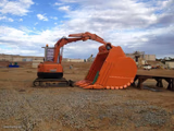 small excavator big shovel