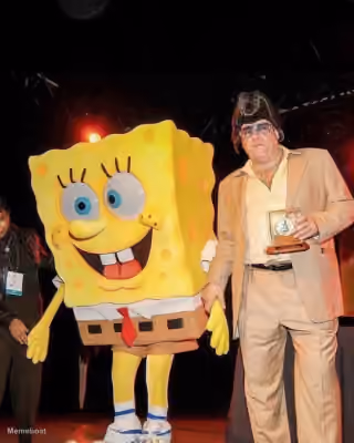 SpongeBob Mascot and Man with Trophy