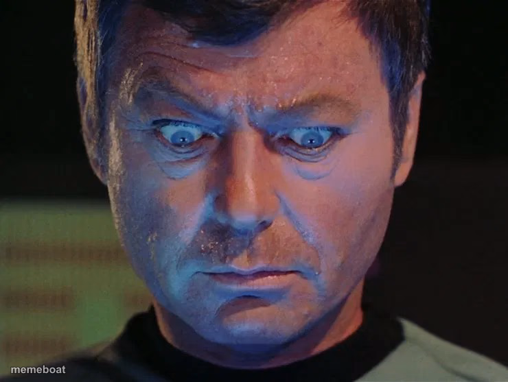 Star Trek McCoy wide eyes looking down - meme generator image preview