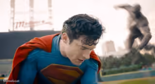 Superman Looking Down While Ultraman Attacks