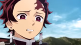 tanjiro looking down on zenitsu