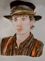 Tom Blyth as Billy the Kid drawing