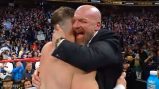 Triple H Hugging John Cena